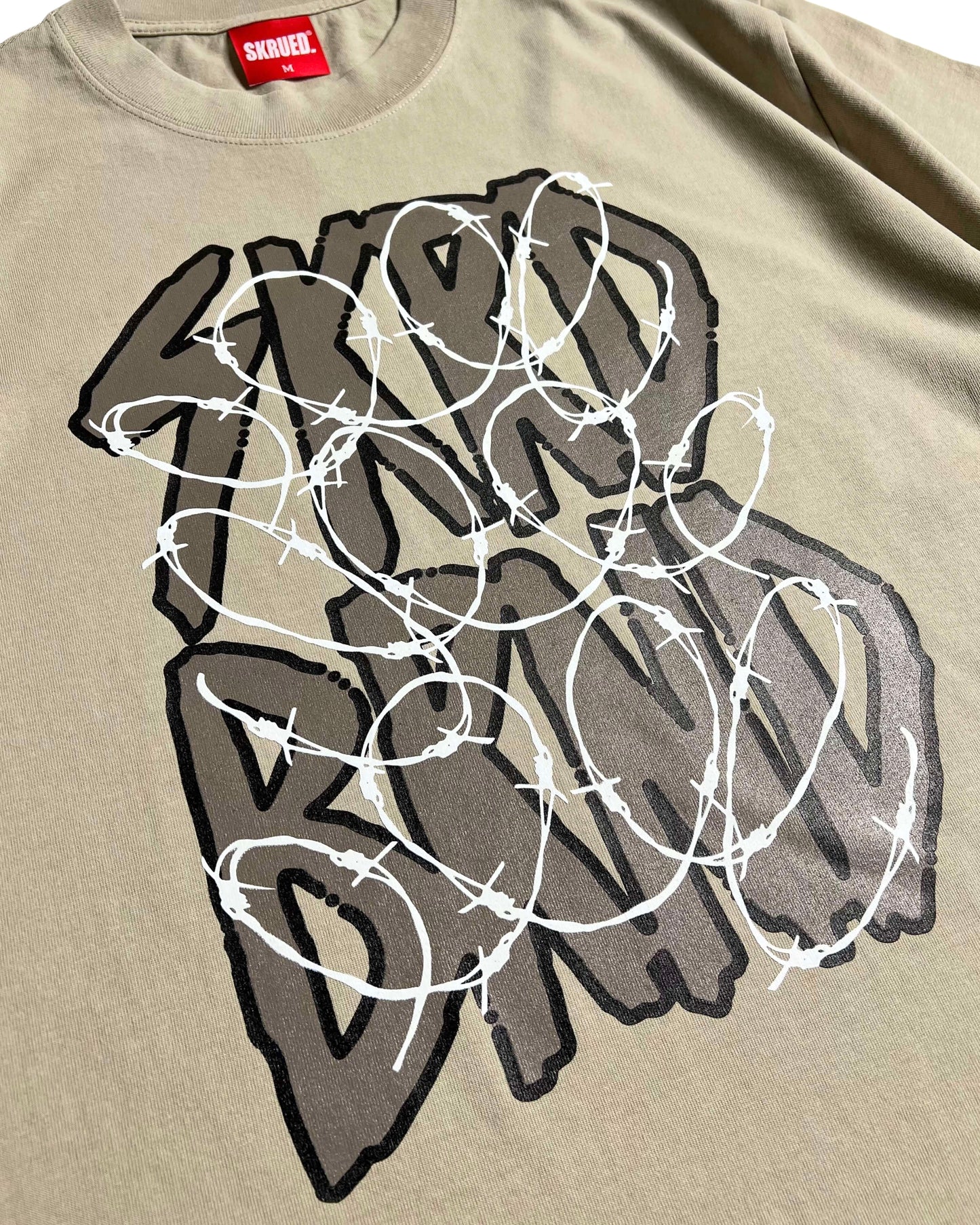 Through the Wire Tee