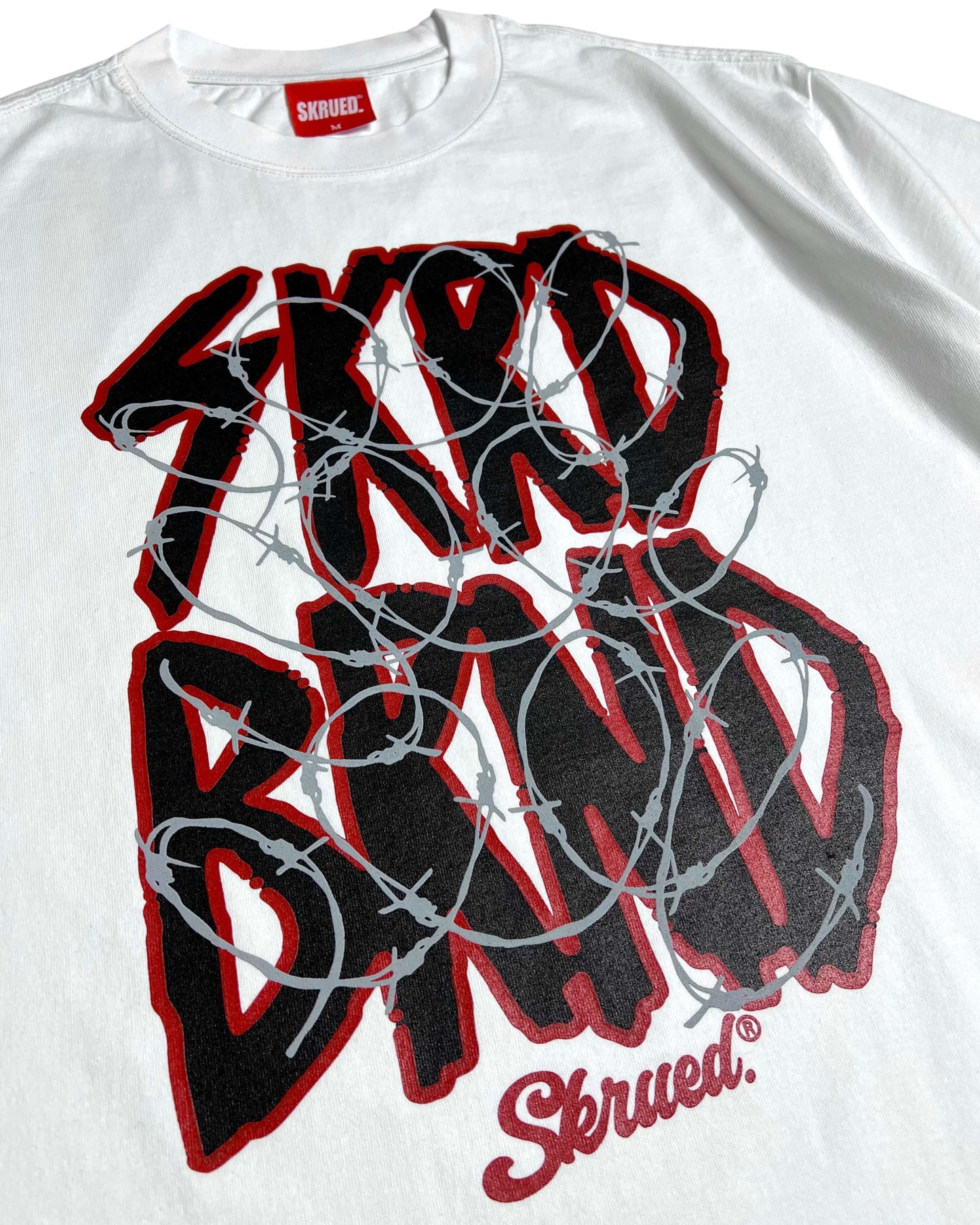 Through the Wire Tee